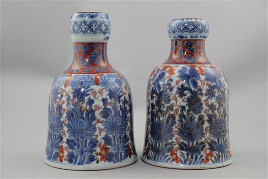 Two Chinese underglaze blue and iron red enamelled bell shaped huqqa bases, Kangxi period, 18cm. and 18.5cm.